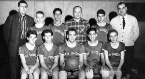 Group photograph of young men's basketball team, wearing "Beth Sholom" uniform t-shirts