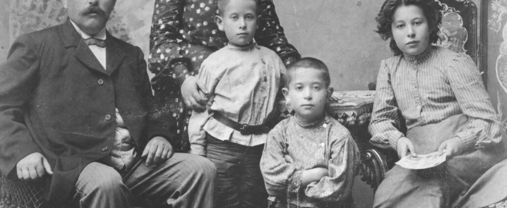 Family portrait showing Max Radom, Fanny Radom (standing) and their three children